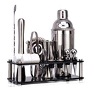 Stainless steel cocktail shaker set with tools for mixing and serving beverages.