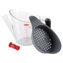2-cup fat separator strainer with measuring cup and filter, ideal for separating fat from cooking liquids.