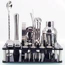 Stainless Steel Cocktail Shaker Set with various mixing tools displayed on a sleek holder.